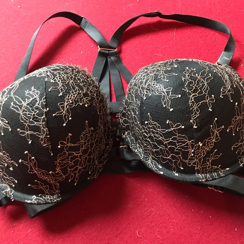 Victoria’s Secret 34DD black with gold embroidery never worn with tag